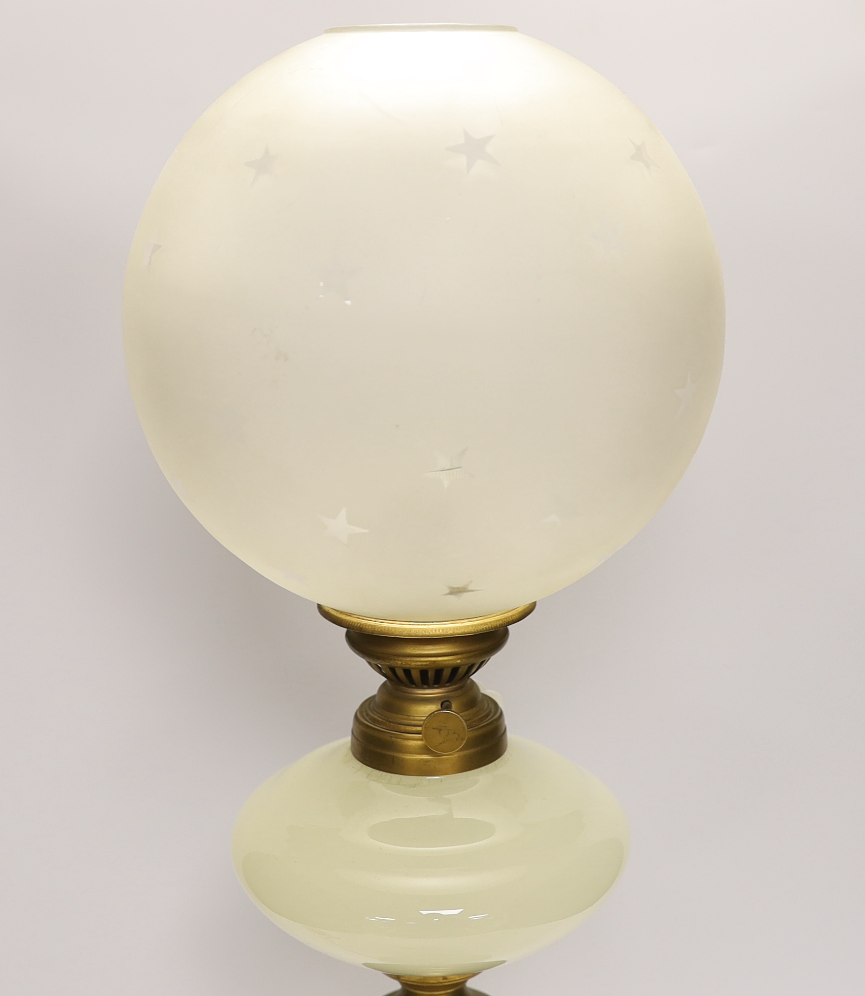 An opaque glass oil converted to a table lamp, 66cm high